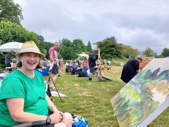 Artist at a landscape painting competition