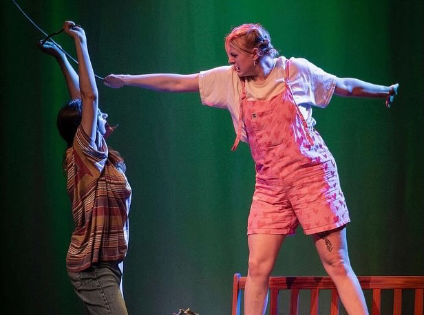 Theatre performance of elen body on stage 
