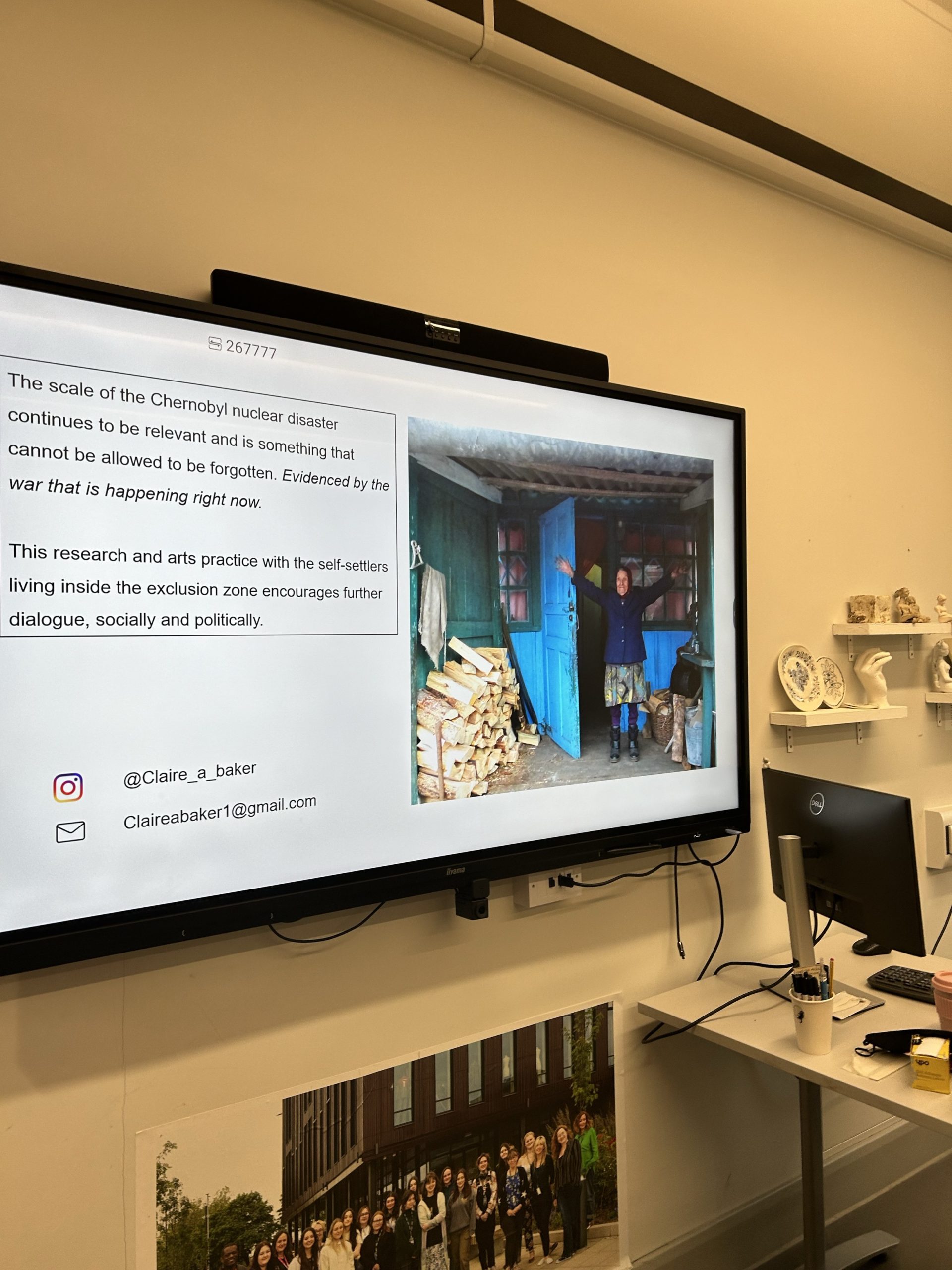 screen with claires research presentation on it