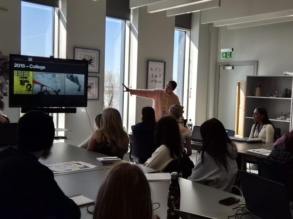 Mia in the studio presenting her work