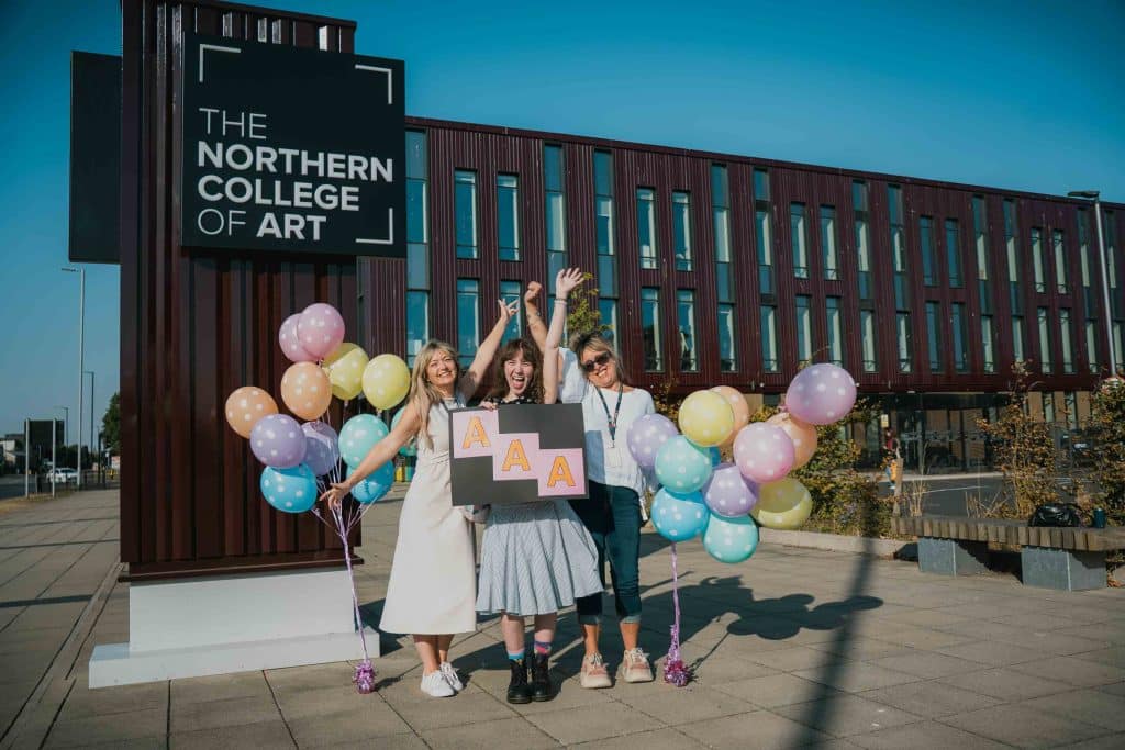 Tutor Katie Slater with student Pheobe Purdy and tutor Amanda Smith celebrating her amazing results