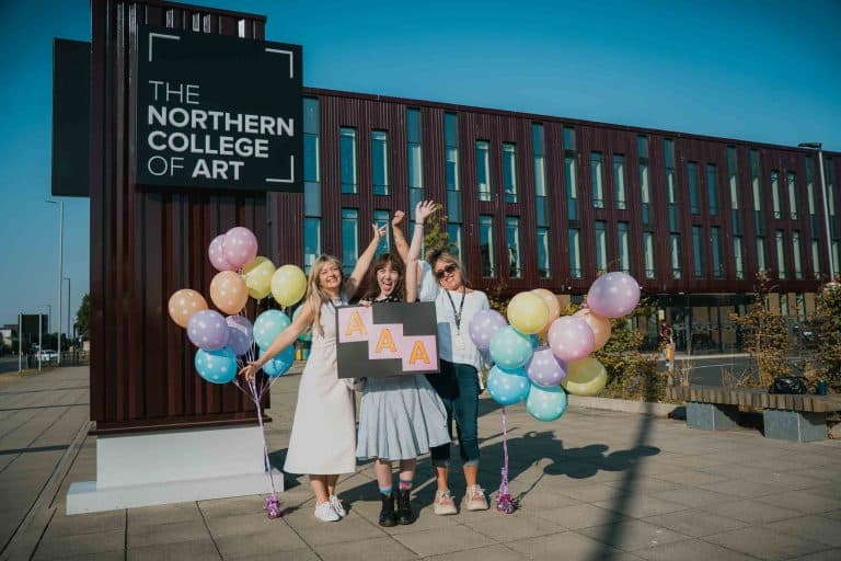 Tutor Katie Slater with student Pheobe Purdy and tutor Amanda Smith celebrating her amazing results